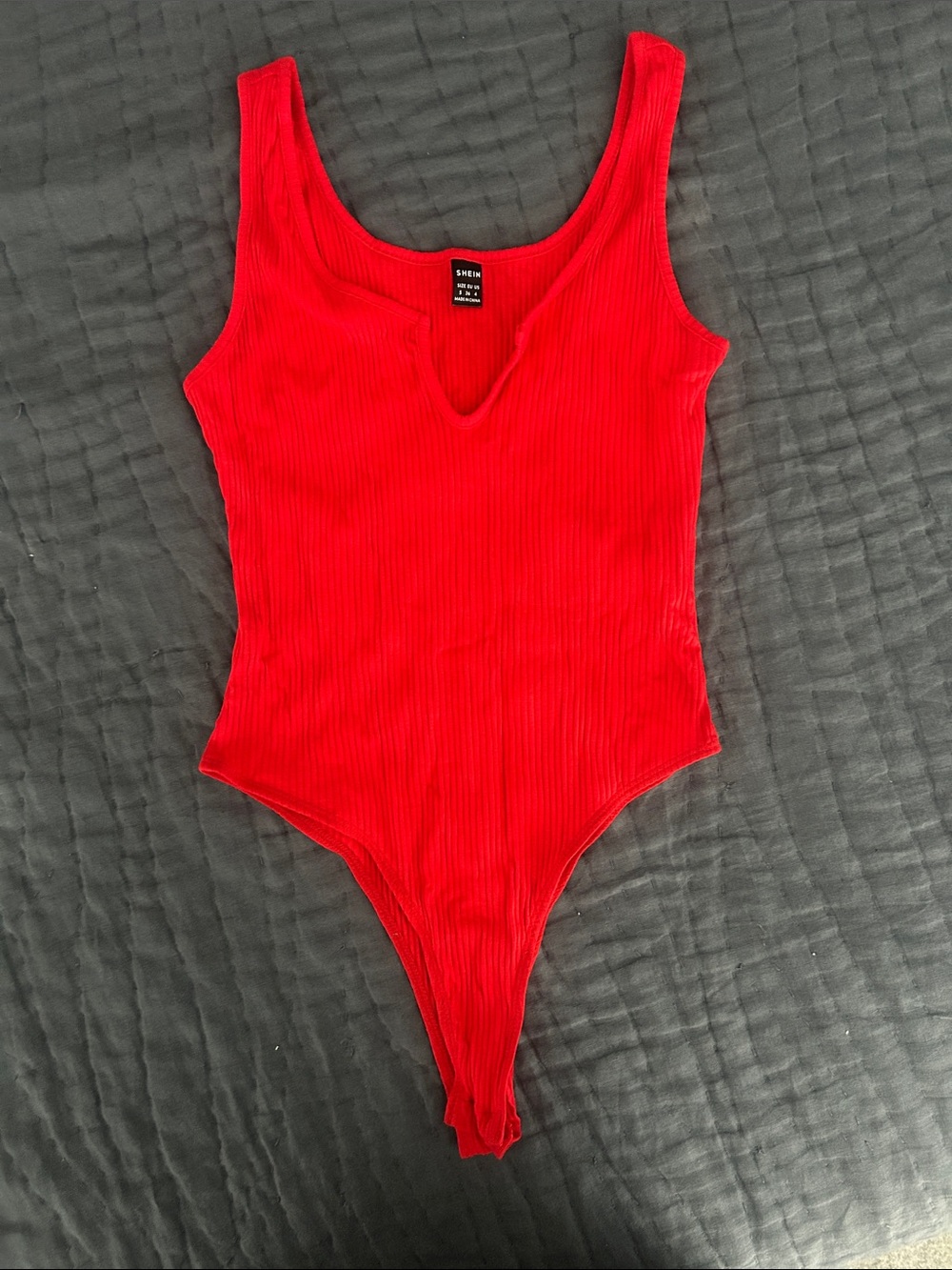 Red Ribbed V-Neck Women’s One-Piece Bodysuit